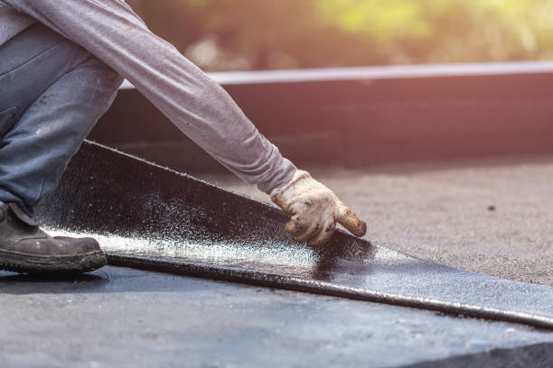 Professional Basement Waterproofing technician working in Somerset Center, MI